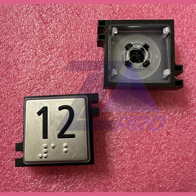 Толкатель кнопки с выдавленной надписью "12" шрифт Брайля Schindler